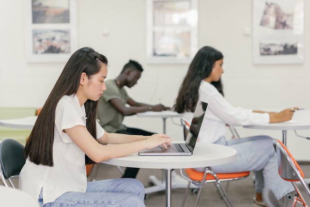 Students sitting in a class learning IELTS from best IELTS Coaching centre